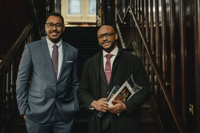 People smiling at an award ceremony 